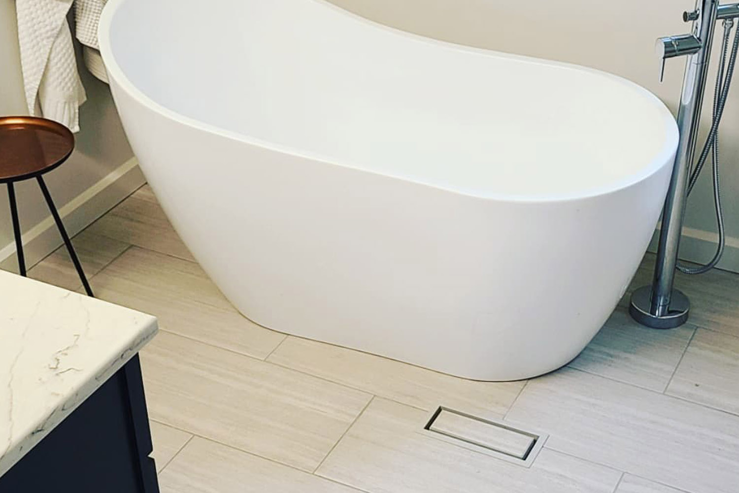 Soaker tub for the win plus custom tiles to make the elegant design really shine.